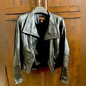 Danier Asymmetrical Leather Jacket with zip front in black. Size XS